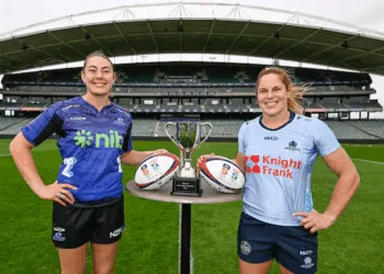 Captains of the Blues and NSW Waratahs pose with the trophy ahead of the Women’s Super Rugby Champions Final 2025.